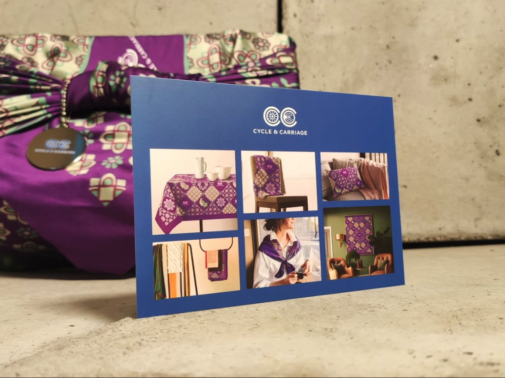Branded eco-friendly corporate gift items arranged with storytelling elements
